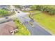 Aerial view showcasing a gated community entrance with manicured landscaping at 6923 Highlands Creek Ave, Lakeland, FL 33813