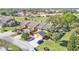 A well-kept townhouse community features mature landscaping and lush lawns at 707 Carpenters Way # 37, Lakeland, FL 33809