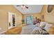 Spacious main bedroom with neutral tones and balcony access at 707 Carpenters Way # 37, Lakeland, FL 33809