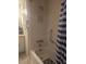 A tiled bathroom featuring a shower/tub and vanity at 1007 Forest Lake Dr, Lakeland, FL 33809