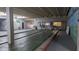 Large shuffleboard area for recreation with plenty of space and natural light at 1007 Forest Lake Dr, Lakeland, FL 33809