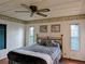 Relaxing bedroom with a ceiling fan and natural light, perfect for rest at 1007 Forest Lake Dr, Lakeland, FL 33809