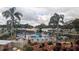 Beautiful community pool area with inviting blue water and well manicured landscaping at 1007 Forest Lake Dr, Lakeland, FL 33809