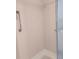 Neutral toned shower featuring a shower head and grab bar for added safety and convenience at 1007 Forest Lake Dr, Lakeland, FL 33809