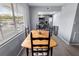 Open dining area adjacent to the kitchen, perfect for entertaining guests at 1100 Martinique Dr # 202, Winter Haven, FL 33884