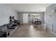 A bright living room with wood floors and furniture at 1100 Martinique Dr # 202, Winter Haven, FL 33884