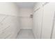 Walk-in closet featuring built-in shelving at 1134 Waterfall Ln # 66, Lakeland, FL 33803