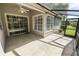 Enclosed patio with sliding glass doors and fan, ideal for outdoor living at 1134 Waterfall Ln # 66, Lakeland, FL 33803