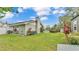 Spacious backyard with lush lawn, hot tub, and shed provides a private outdoor retreat at 1160 Ilene Ave, Bartow, FL 33830