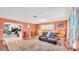 Vibrant living room with an open floor plan, featuring coastal-themed décor and warm colors at 1160 Ilene Ave, Bartow, FL 33830