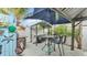 Outdoor grilling area with a grill and bar area at 1160 Ilene Ave, Bartow, FL 33830