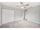 Bedroom with an ensuite bath and carpeted flooring at 1180 E Hill Ct, Bartow, FL 33830