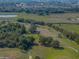 Aerial view of a community surrounded by lush greenery, showcasing the natural beauty and serene environment of the area at 121 Greenfield Rd, Winter Haven, FL 33884