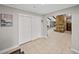 Open foyer featuring tile flooring, a closet, and an archway to the dining room at 121 Greenfield Rd, Winter Haven, FL 33884