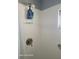 Corner shower stall with toiletries and a bronze colored faucet at 1810 Blue Lake Dr, Lakeland, FL 33801