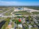An aerial view highlights the location of the home within the surrounding residential area at 3823 Woodburn E Loop, Lakeland, FL 33813