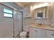 Bathroom featuring shower, toilet, vanity with storage at 3823 Woodburn E Loop, Lakeland, FL 33813