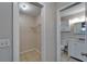 Bathroom and closet featuring a vanity, tile flooring, and storage at 3823 Woodburn E Loop, Lakeland, FL 33813