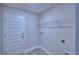 Small storage area with a wire rack at 4032 Tullamore Ln, Auburndale, FL 33823