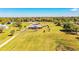 Aerial of ranch style home on expansive lot with outbuildings at 408 Old Bartow Lake Wales Rd, Bartow, FL 33830