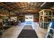 Spacious barn interior has concrete floors and exposed beam ceilings with lots of room for storage at 408 Old Bartow Lake Wales Rd, Bartow, FL 33830