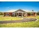 Charming single-story home with metal roof and circular driveway at 408 Old Bartow Lake Wales Rd, Bartow, FL 33830