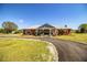 Attractive single-story home with metal roof and long driveway at 408 Old Bartow Lake Wales Rd, Bartow, FL 33830