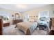 Bright bedroom with natural light, carpeted floor, and furniture at 4908 S Bedford Ln, Lakeland, FL 33813