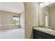 En-suite bathroom with granite countertops and a neutral color scheme at 4929 Tennessee Lake Dr, Auburndale, FL 33823