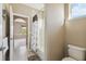 Bathroom with a shower/tub and a door leading to the bedroom at 4929 Tennessee Lake Dr, Auburndale, FL 33823