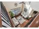 Aerial view of the living room with hardwood floors, stylish furniture, and plenty of natural light at 4929 Tennessee Lake Dr, Auburndale, FL 33823