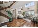 Elegant living room featuring hardwood floors, high ceilings, and abundant natural light at 4929 Tennessee Lake Dr, Auburndale, FL 33823