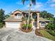 Stately two-story home with a well manicured lawn, two car garage and ample parking at 502 Lake Harris Dr, Lakeland, FL 33813