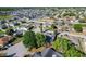 Expansive aerial view of a residential community with well-maintained homes and green spaces at 5730 Tanasi Ct, Lakeland, FL 33812