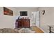 Bedroom with a neutral color scheme, ceiling fan, vinyl wood flooring and a patriotic themed decor at 5798 Dornich Dr, Auburndale, FL 33823