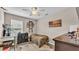 Bedroom with a camo decor, ceiling fan, large window, and a vinyl wood flooring at 5798 Dornich Dr, Auburndale, FL 33823