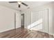 Bedroom featuring new floors and a closet at 604 W 10Th St, Lakeland, FL 33805