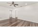 Spacious living room featuring new floors and a ceiling fan at 604 W 10Th St, Lakeland, FL 33805