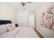 Bedroom with neutral walls, wood-style floors, and a double-door closet. Interior home shot at 6515 Eagle View Loop, Lakeland, FL 33813