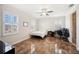 Bedroom with fan, tile flooring, neutral color, and bright natural light at 6515 Eagle View Loop, Lakeland, FL 33813