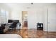 Bedroom featuring a desk, a workspace, and a glimpse into an ensuite bathroom at 6515 Eagle View Loop, Lakeland, FL 33813