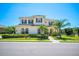 Charming two-story home with manicured landscaping and a paver walkway, blending elegance with curb appeal at 6515 Eagle View Loop, Lakeland, FL 33813