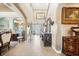 Grand foyer with high ceilings, arched doorways, tile flooring, and decorative furnishings creating a welcoming ambiance at 6515 Eagle View Loop, Lakeland, FL 33813