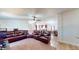 Inviting living room showing natural light and an open transition to kitchen and dining area at 6525 Glen Meadow Dr, Lakeland, FL 33810