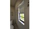 Bathroom with a window at 692 Augusta Rd, Winter Haven, FL 33884
