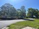 Prominent Cypresswood sign surrounded by lush landscaping, marking the entrance to this community at 692 Augusta Rd, Winter Haven, FL 33884