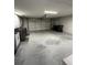 Spacious garage with laundry, and ample room for storage and vehicles at 692 Augusta Rd, Winter Haven, FL 33884
