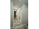 Hallway with modern wood-look flooring, neutral paint, and a modern light fixture at 692 Augusta Rd, Winter Haven, FL 33884