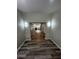 Laminate floors leading to kitchen and island at 692 Augusta Rd, Winter Haven, FL 33884