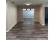 Spacious open-concept living area with modern flooring and ample natural light at 692 Augusta Rd, Winter Haven, FL 33884